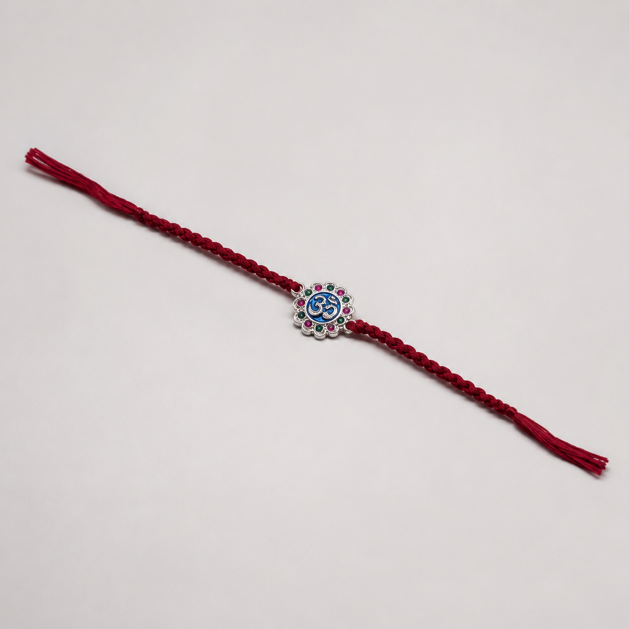Om Stone Silver Rakhi